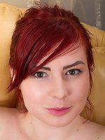 On her leather chair, Red Bunny puts on a show